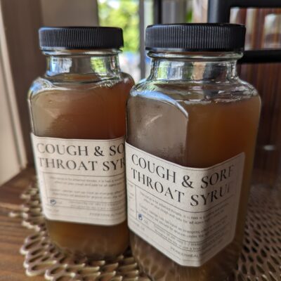 cough and sore throat syrup bottles
