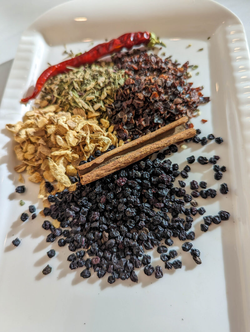 dried herbs elderberry cinnamon stick rose hips ginger root echinacea cayenne pepper