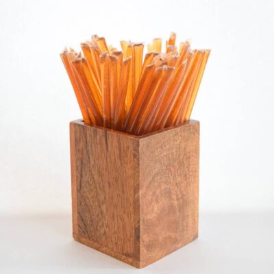 honey sticks in a wood box