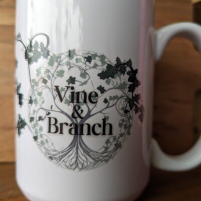 vine and branch logo handmade ceramic mug