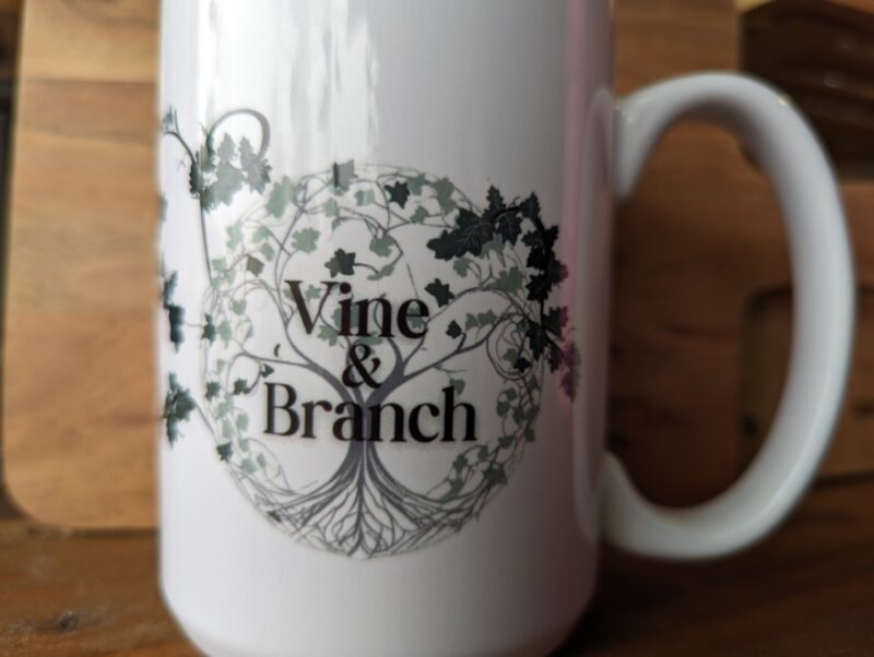 vine and branch logo handmade ceramic mug