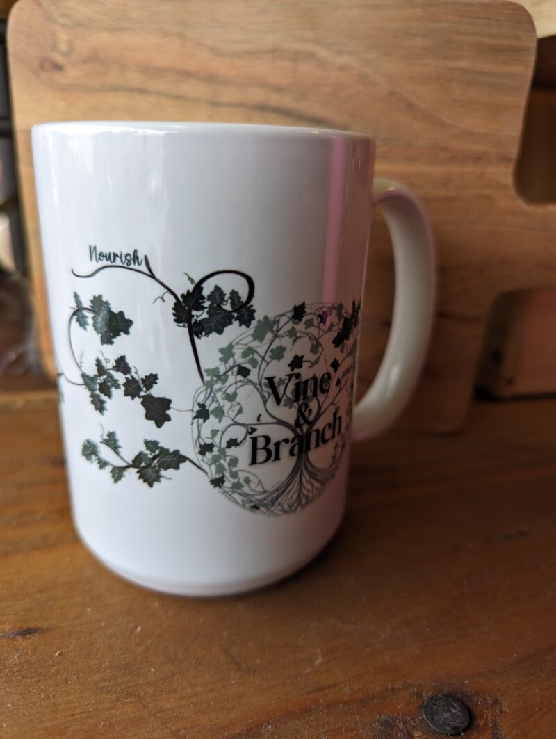 vine and branch logo handmade ceramic mug