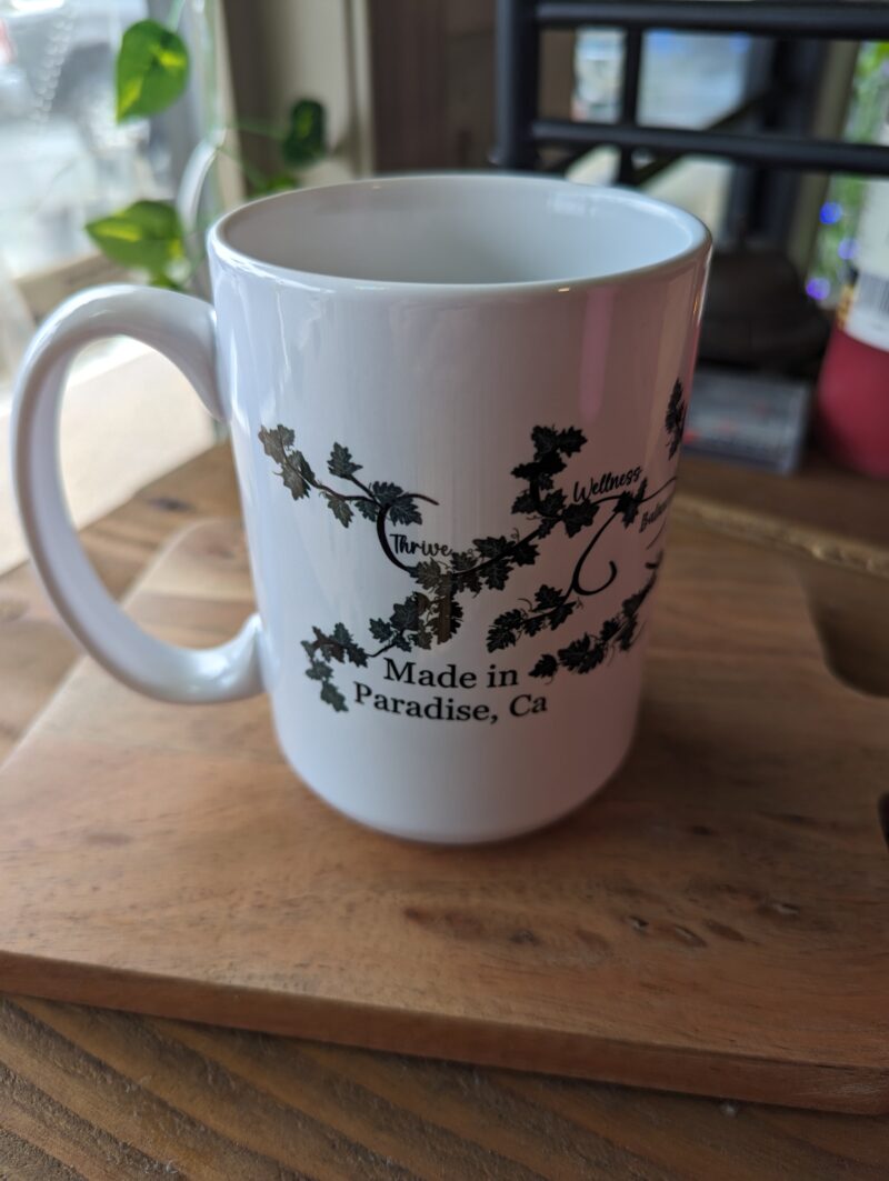 vine and branch logo handmade ceramic mug