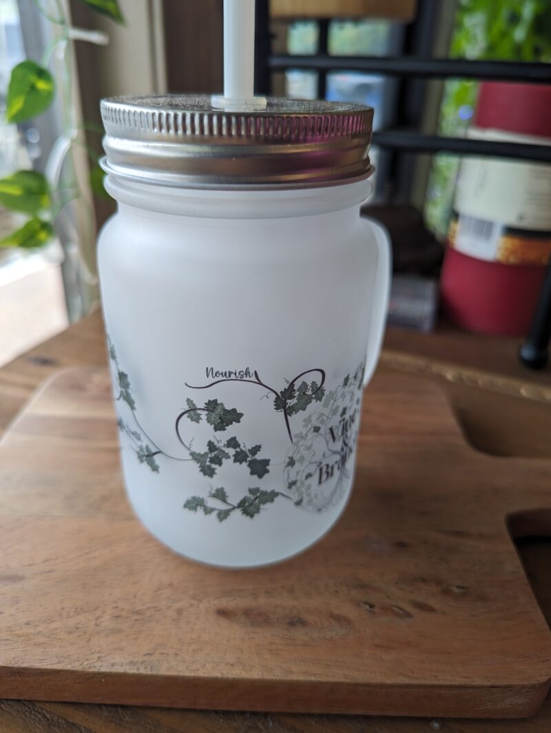 handmade frosted mason jar with lid and straw